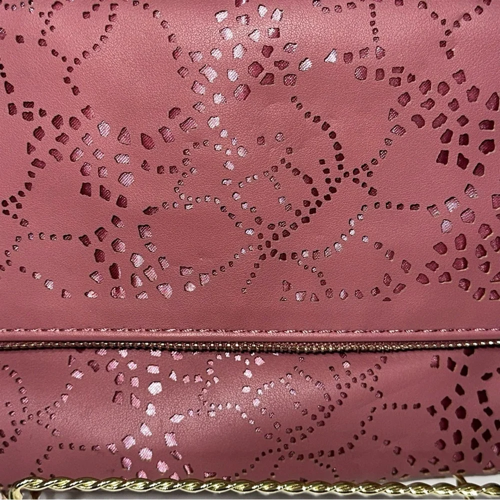 Urban Expressions Pink Laser Cut “Locket” Clutch. New without tags